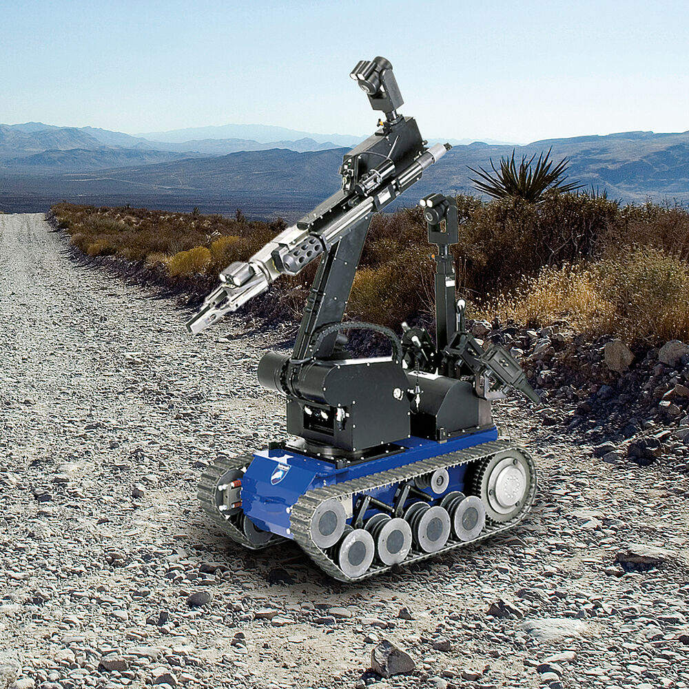 Motori CC continua in robot mobile fuoristrada su battistrada a cingoli